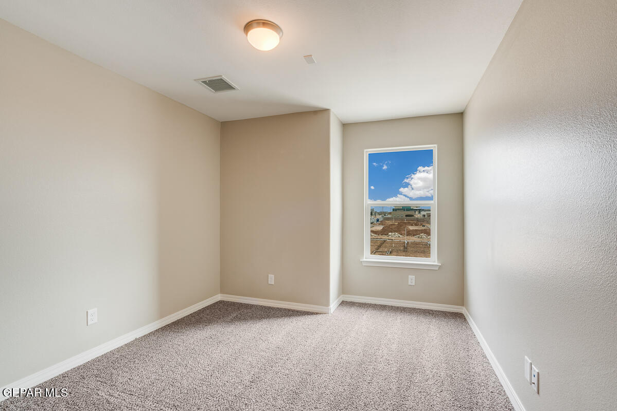 12432 Fill Ball El Paso, TX 79928 - Photo 24 of 37 an empty room with windows