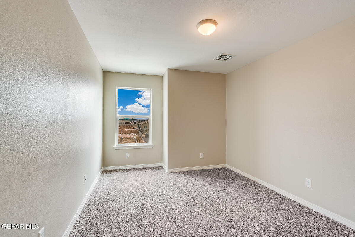 12432 Fill Ball El Paso, TX 79928 - Photo 26 of 37 an empty room with windows