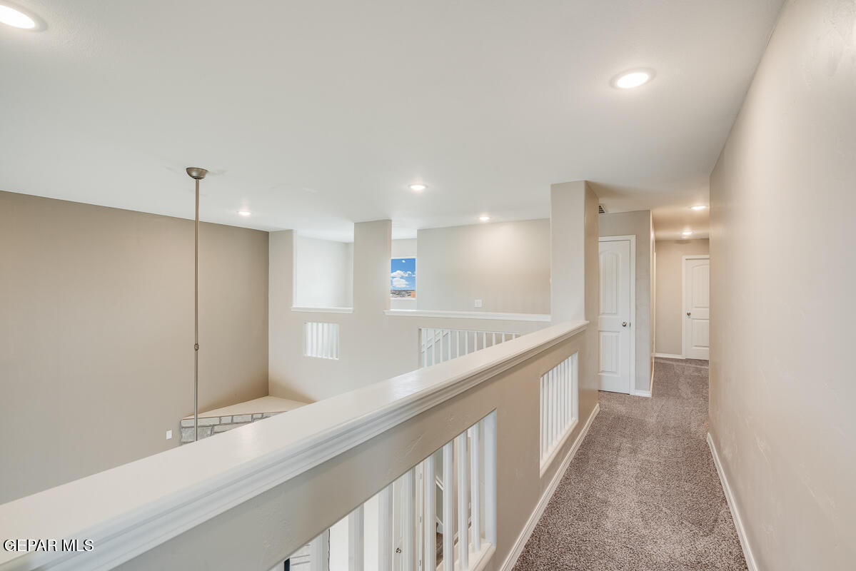 12432 Fill Ball El Paso, TX 79928 - Photo 29 of 37 a bathroom with a sink and a large mirror
