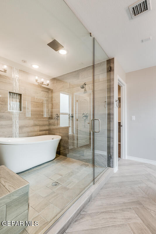 12432 Fill Ball El Paso, TX 79928 - Photo 35 of 37 a large spacious bathroom with a glass shower door