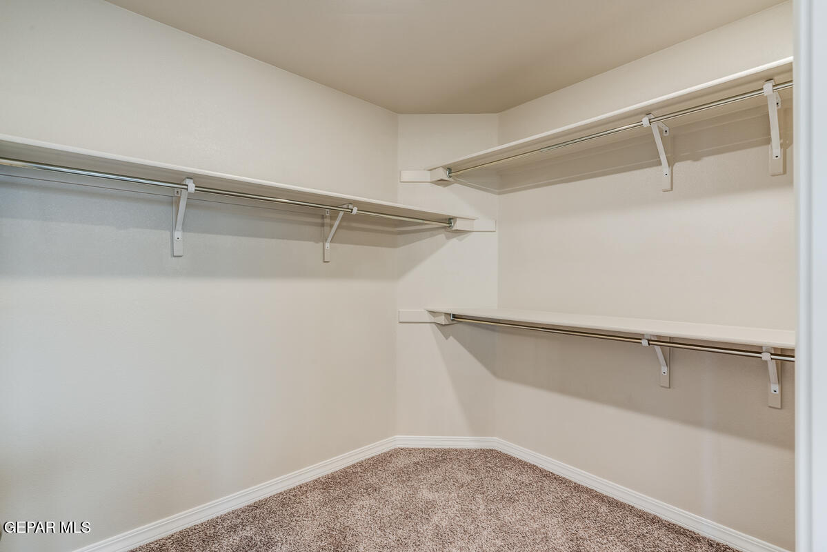 12432 Fill Ball El Paso, TX 79928 - Photo 36 of 37 a view of an empty walk in closet