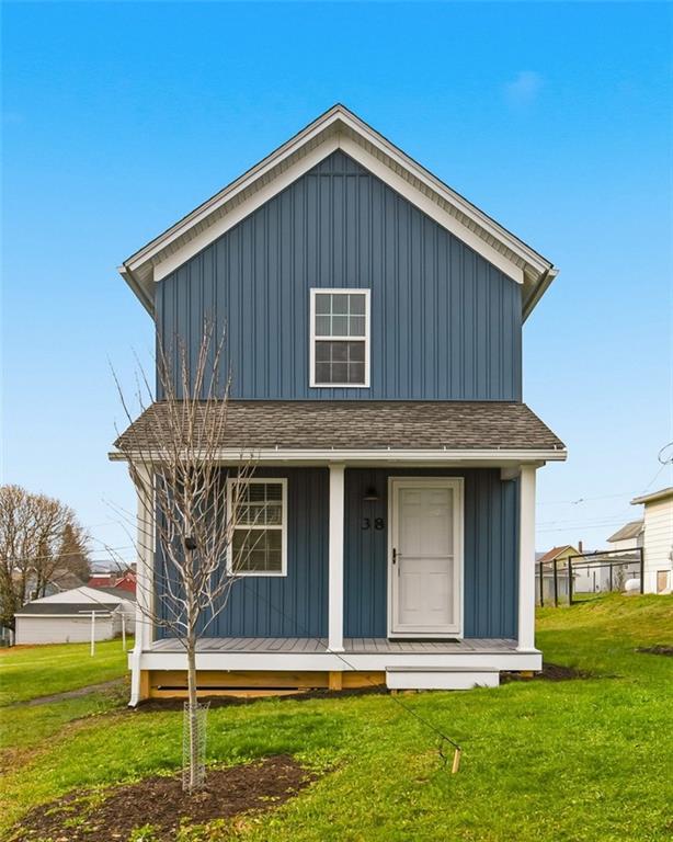 38 3rd Street Cairnbrook, PA 15924 - Photo 1 of 29 a front view of a house with garden