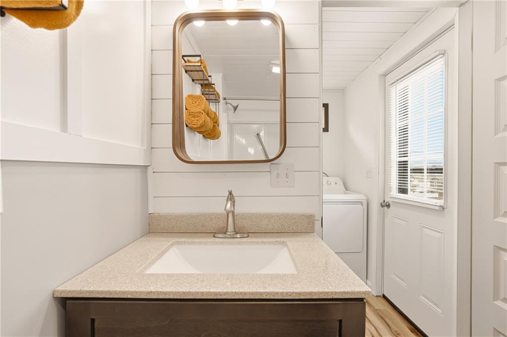 38 3rd Street Cairnbrook, PA 15924 - Photo 16 of 29 a bathroom with a sink and a mirror