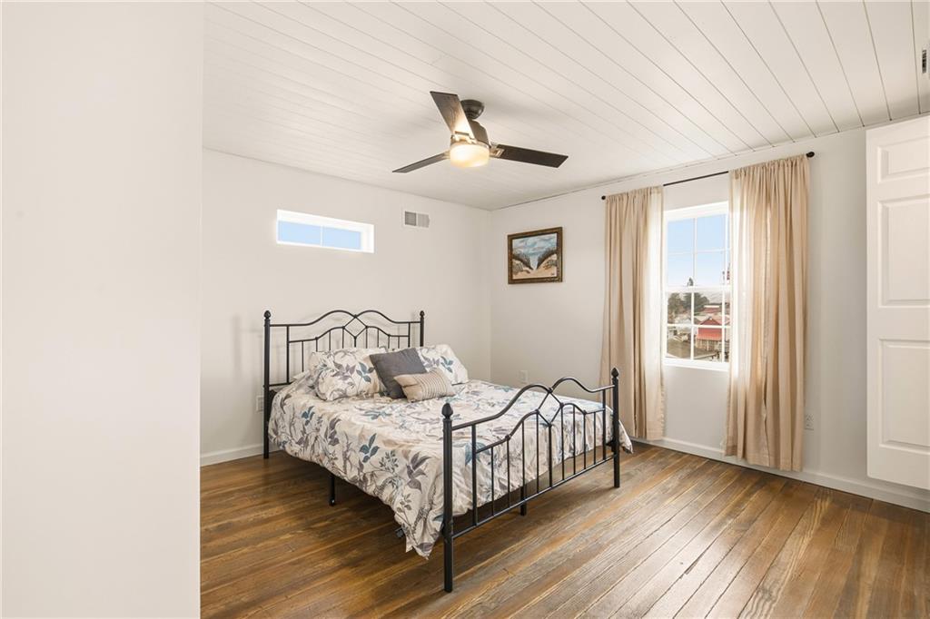 38 3rd Street Cairnbrook, PA 15924 - Photo 19 of 29 a bedroom with a bed and a window