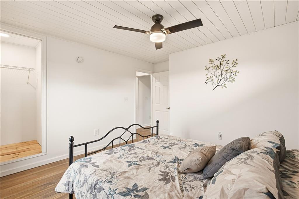 38 3rd Street Cairnbrook, PA 15924 - Photo 20 of 29 a bedroom with a bed and a chandelier