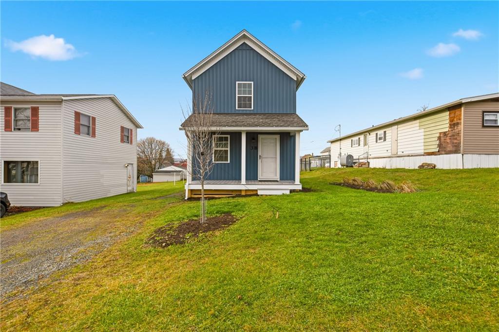 38 3rd Street Cairnbrook, PA 15924 - Photo 2 of 29 a view of an house with backyard and garden
