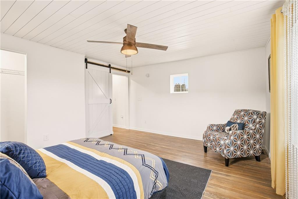 38 3rd Street Cairnbrook, PA 15924 - Photo 22 of 29 a bedroom with bed and window