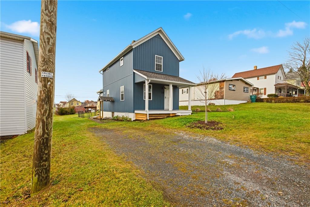 38 3rd Street Cairnbrook, PA 15924 - Photo 3 of 29 a front view of a house with a yard