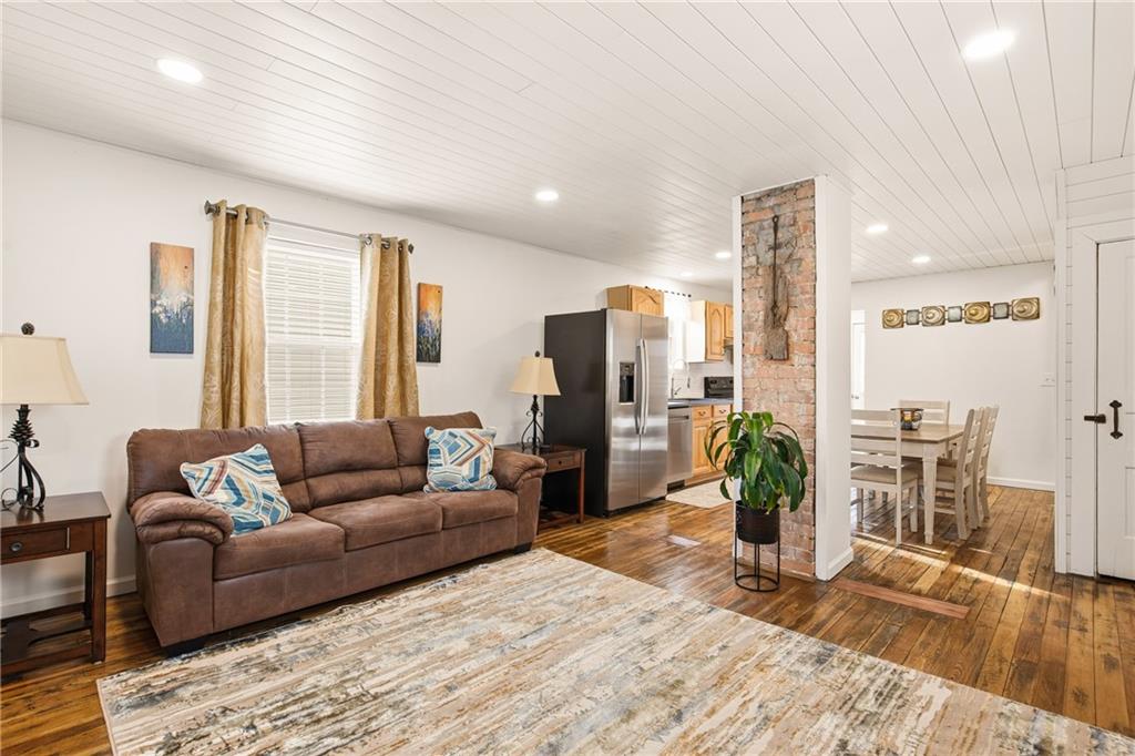 38 3rd Street Cairnbrook, PA 15924 - Photo 6 of 29 a living room with furniture potted plant and kitchen view