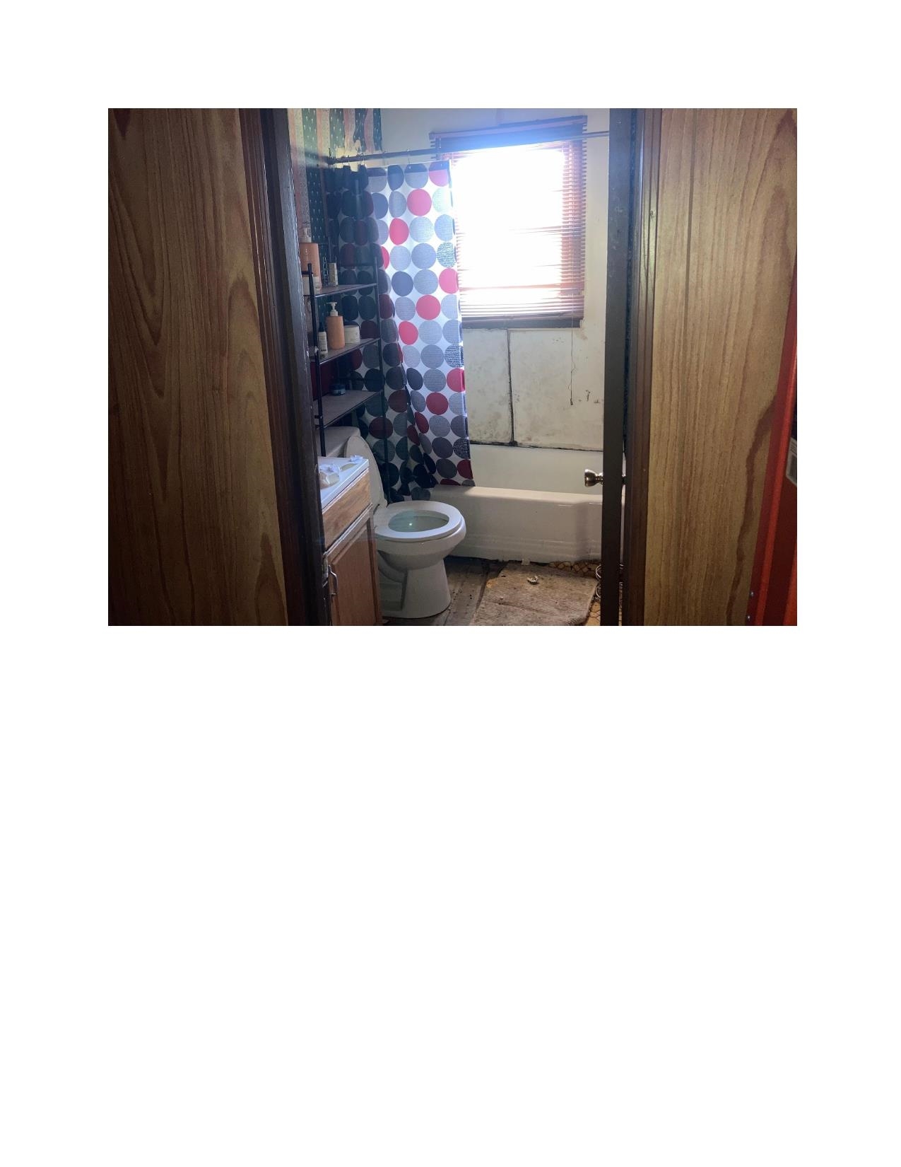 3063 Calvert Avenue Memphis, TN 38108 - Photo 11 of 18 Full bathroom with shower / bath combination with curtain and vanity