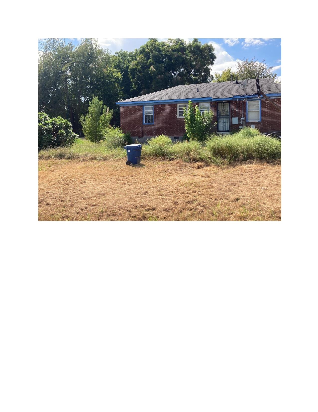 3063 Calvert Avenue Memphis, TN 38108 - Photo 18 of 18 View of grassy yard
