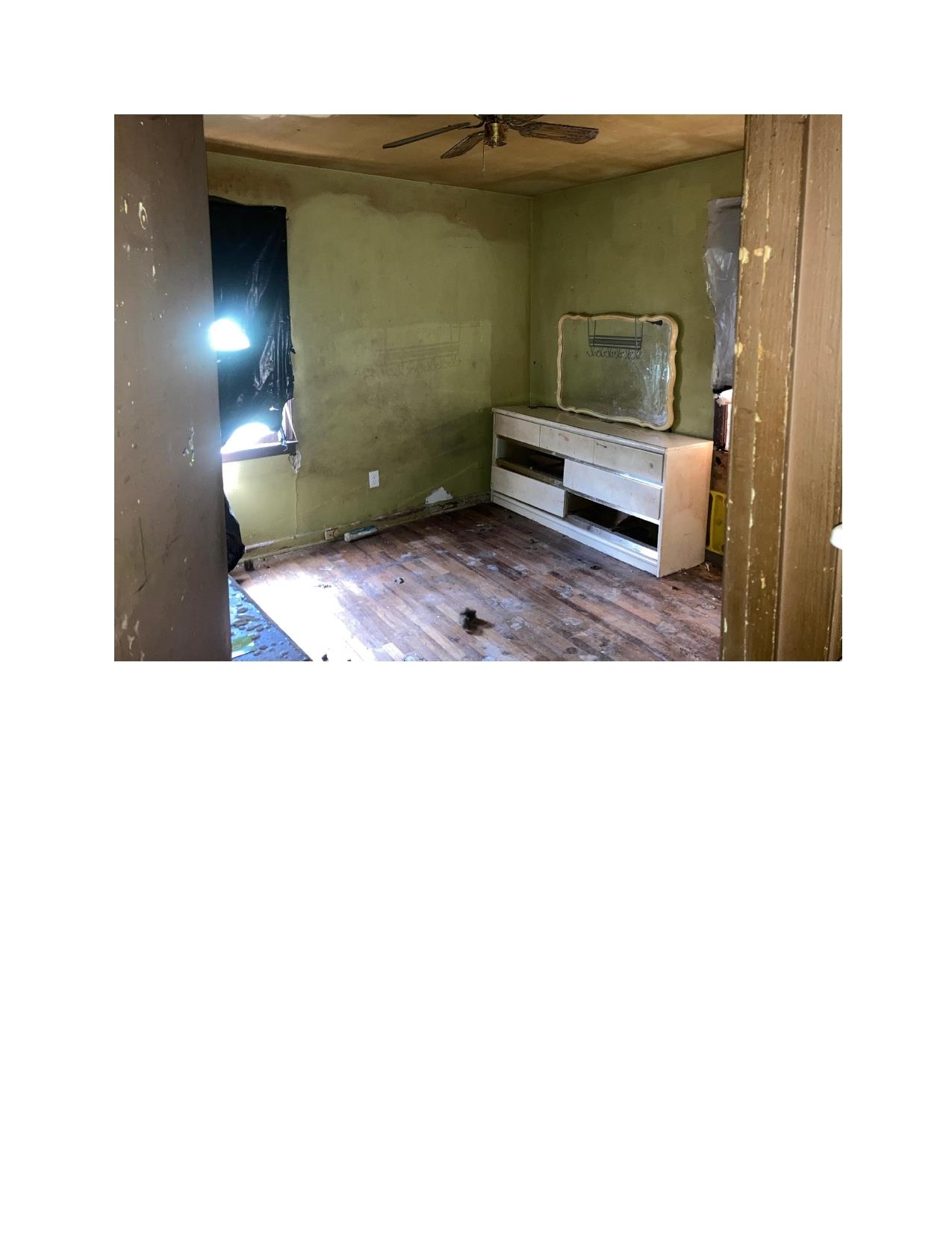 3063 Calvert Avenue Memphis, TN 38108 - Photo 4 of 18 Unfurnished office featuring dark wood finished floors and ceiling fan