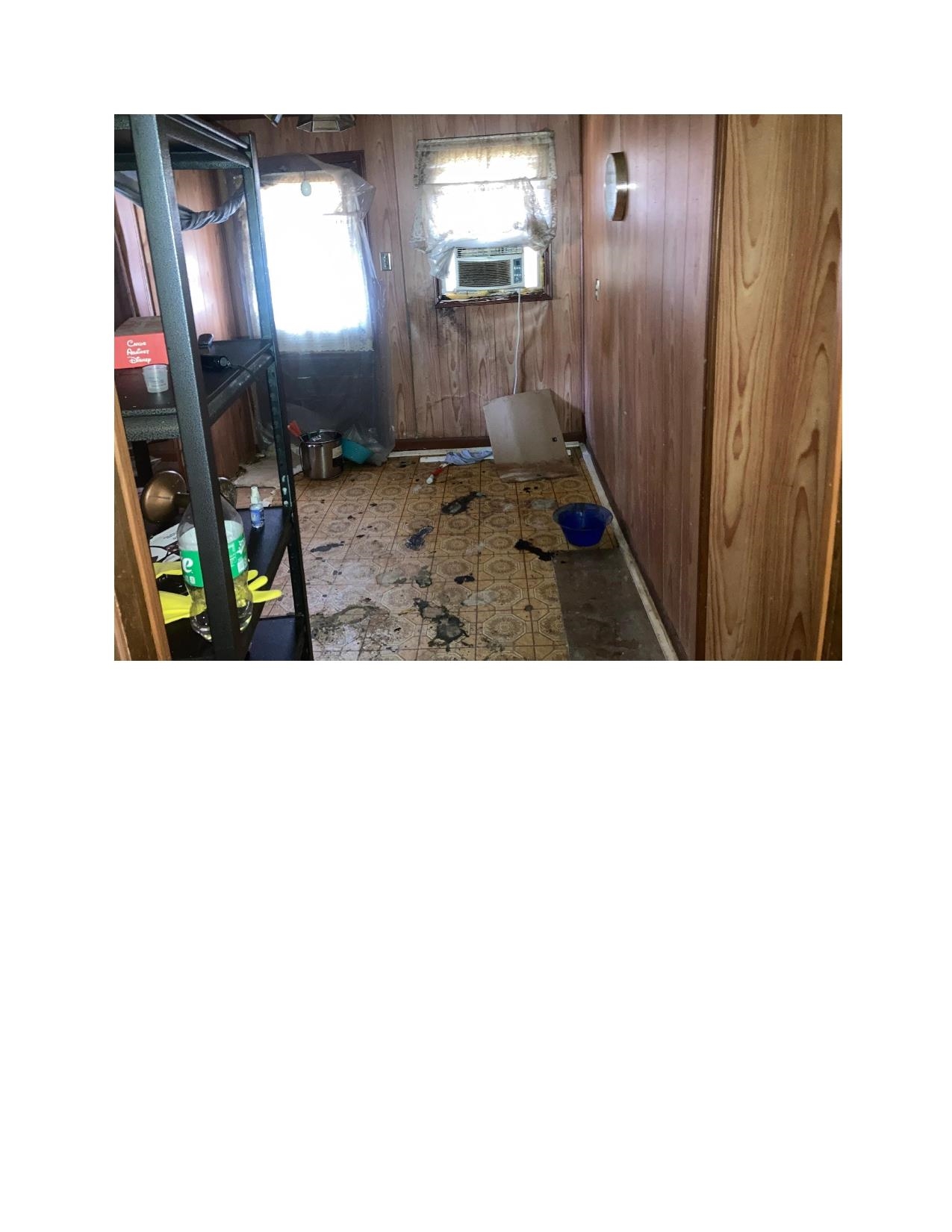 3063 Calvert Avenue Memphis, TN 38108 - Photo 5 of 18 Laundry room featuring wooden walls
