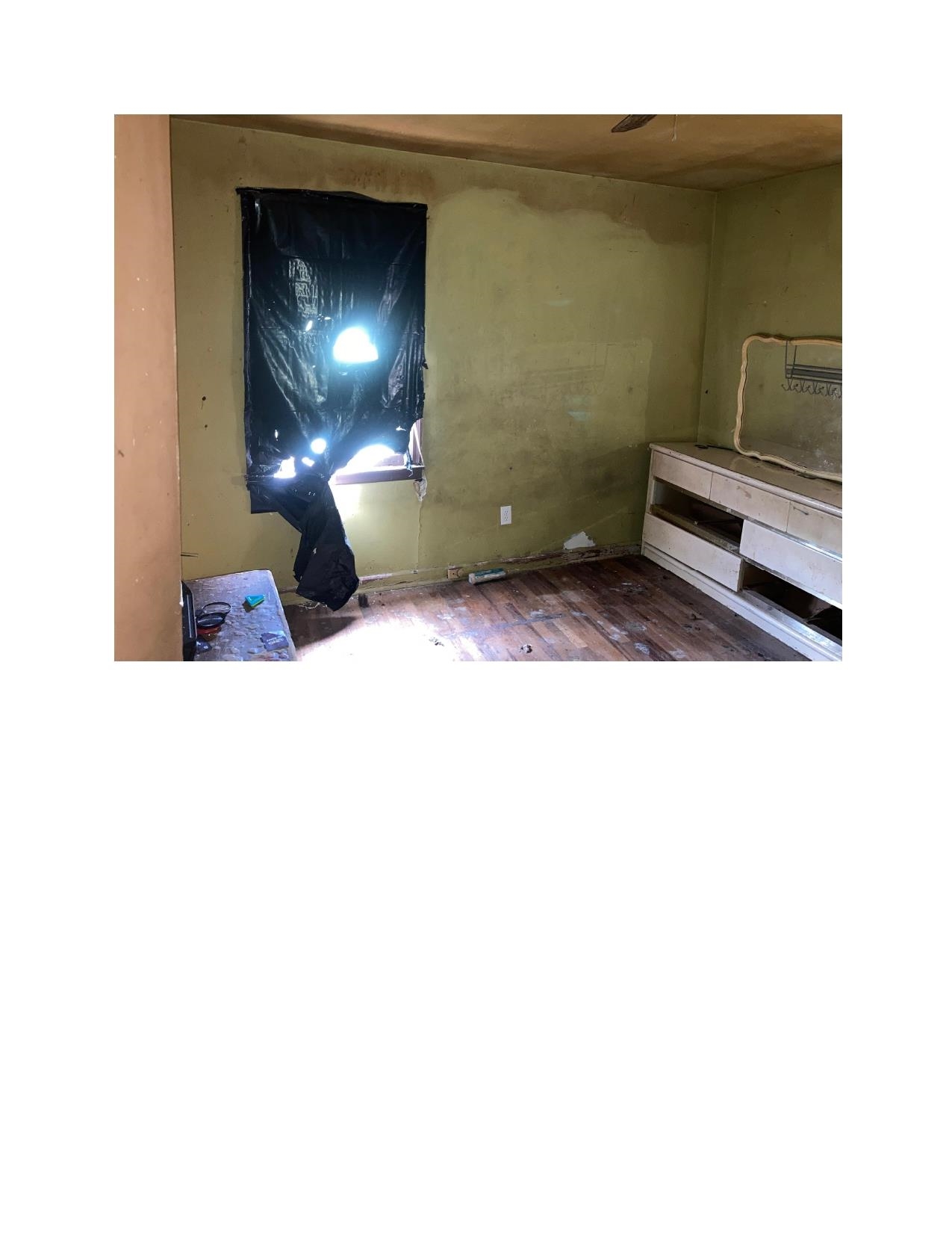 3063 Calvert Avenue Memphis, TN 38108 - Photo 10 of 18 Unfurnished bedroom featuring dark wood finished floors