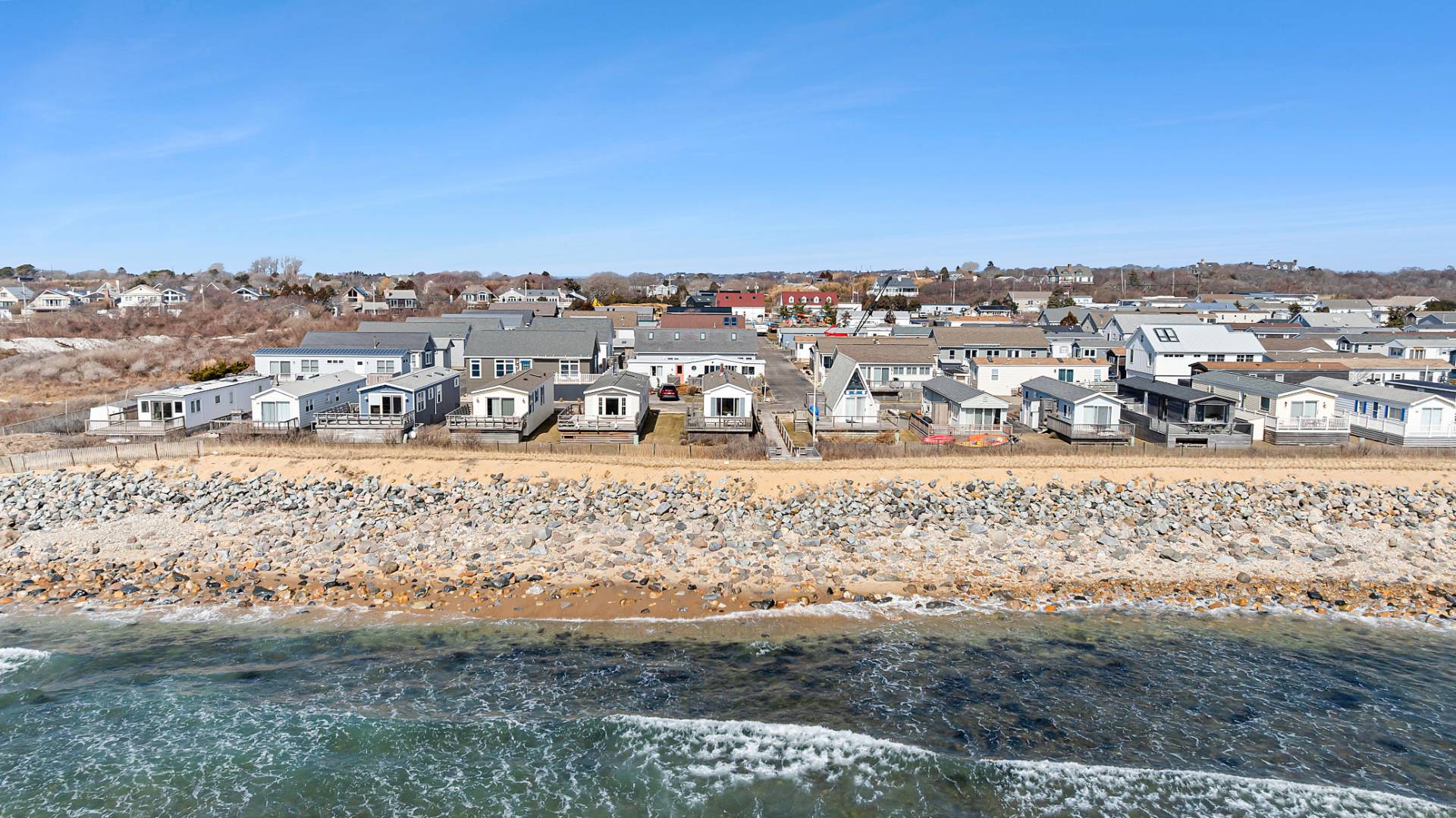 100 Deforest Road, Unit 6 Montauk, NY 11954 - Photo 2 of 6 a view of a city