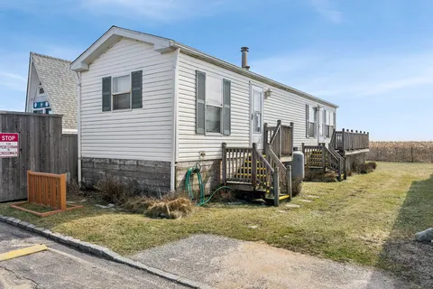 a view of a house with a patio