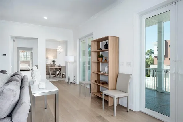 a view of a dining room with furniture window and outside view
