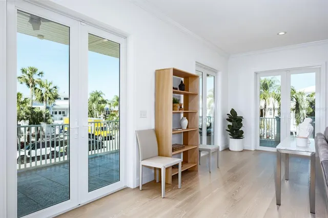 a bedroom with a bed and a table