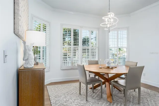 a bedroom with a bed and a table