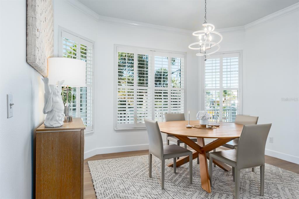 1700 Oyster Point Way Palm Harbor, FL 34683 - Photo 28 of 88 a view of a dining room with furniture window and outside view