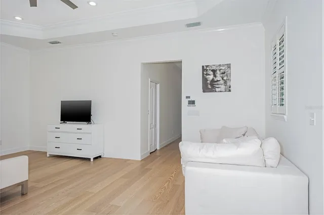 a bathroom with a granite countertop sink a toilet and with mirror