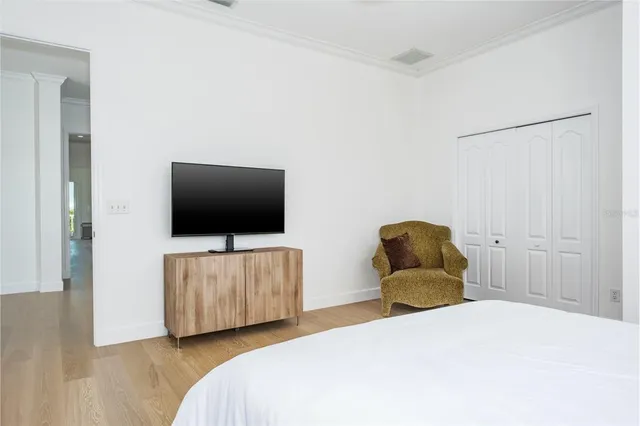 a view of a porch with wooden floor and fence