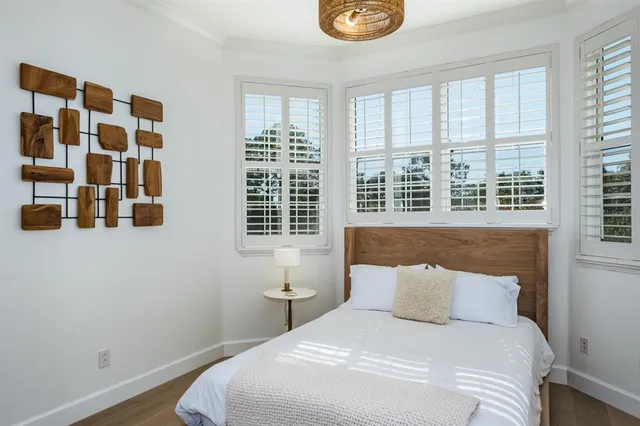 an outdoor sitting area with an umbrella