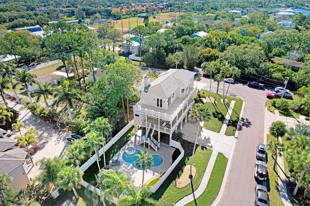 1700 Oyster Point Way Palm Harbor, FL 34683 - Photo 6 of 88 an aerial view of house with yard swimming pool and outdoor seating