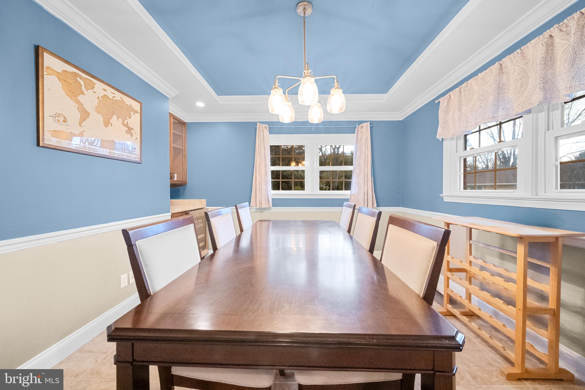 10600 Springmann Drive Fairfax, VA 22030 - Photo 16 of 78 a view of a dining room with furniture window and wooden floor