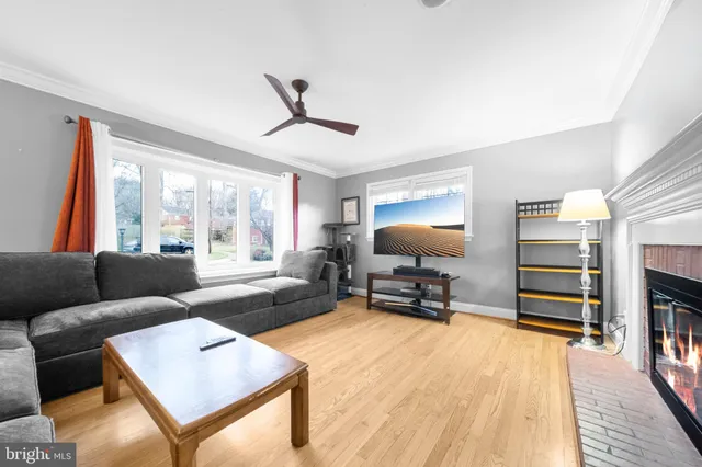 a spacious bedroom with a large bed and a large window