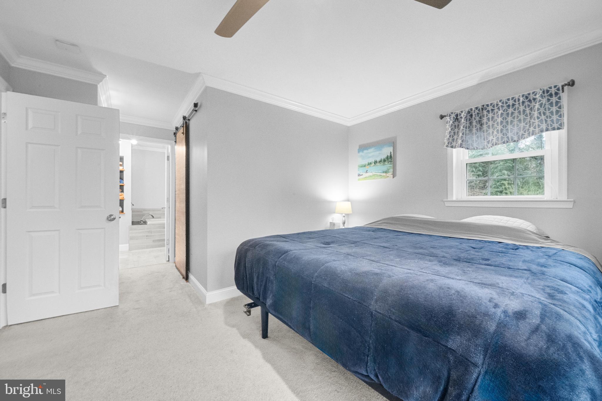 10600 Springmann Drive Fairfax, VA 22030 - Photo 29 of 78 a bedroom with a bed and a window