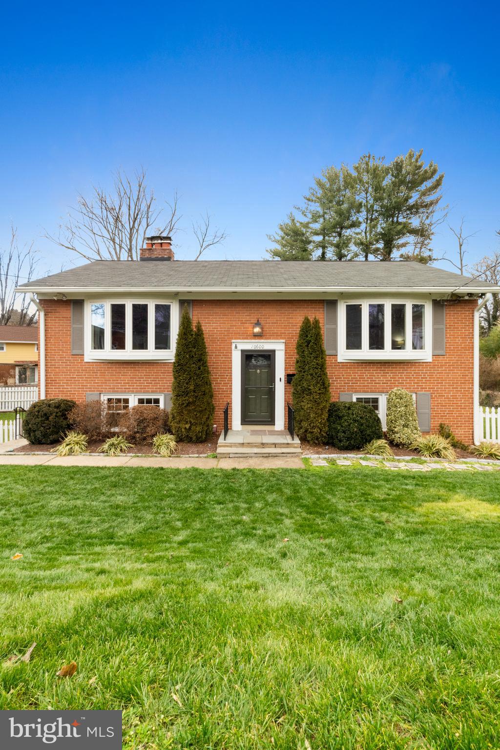 10600 Springmann Drive Fairfax, VA 22030 - Photo 3 of 78 front view of a house with a yard