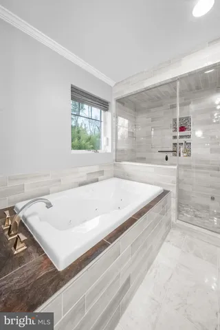 a view of a kitchen with a washer and dryer