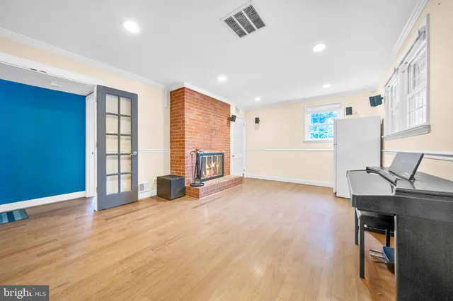 a view of a chair and table on the deck