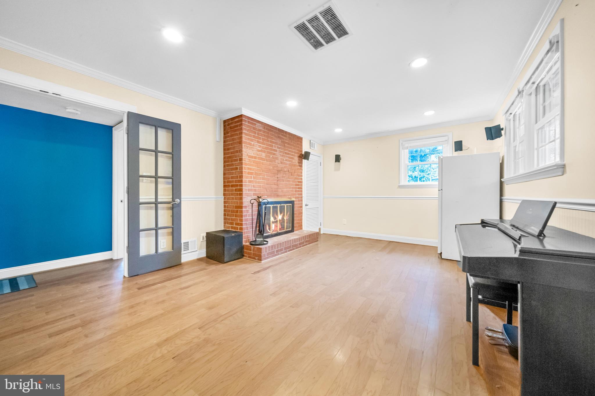 10600 Springmann Drive Fairfax, VA 22030 - Photo 41 of 78 a view of an empty room with window and wooden floor