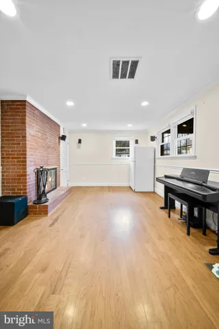 a view of a chairs and table on the wooden floor