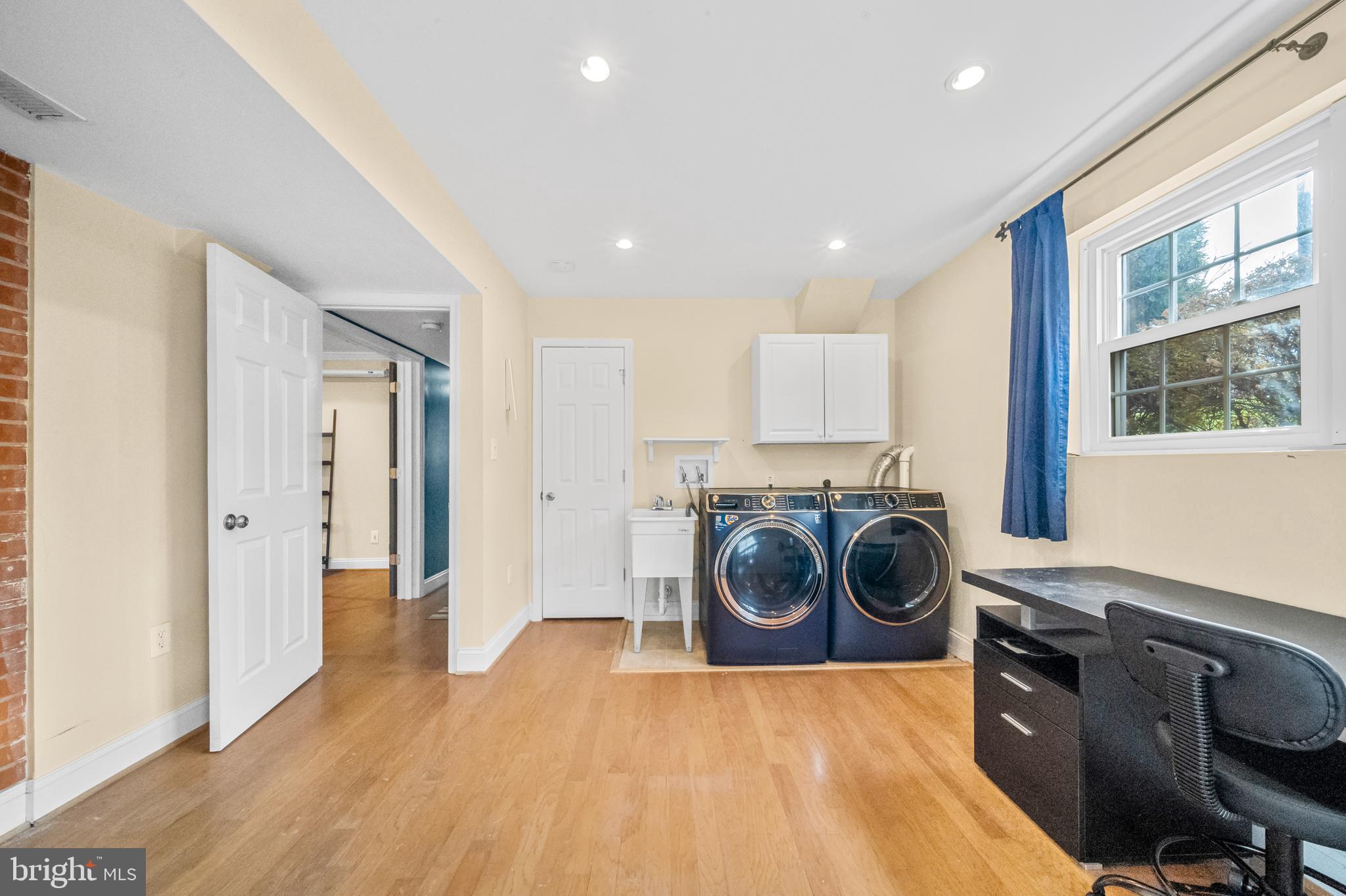 10600 Springmann Drive Fairfax, VA 22030 - Photo 48 of 78 a view of a kitchen with a washer and dryer