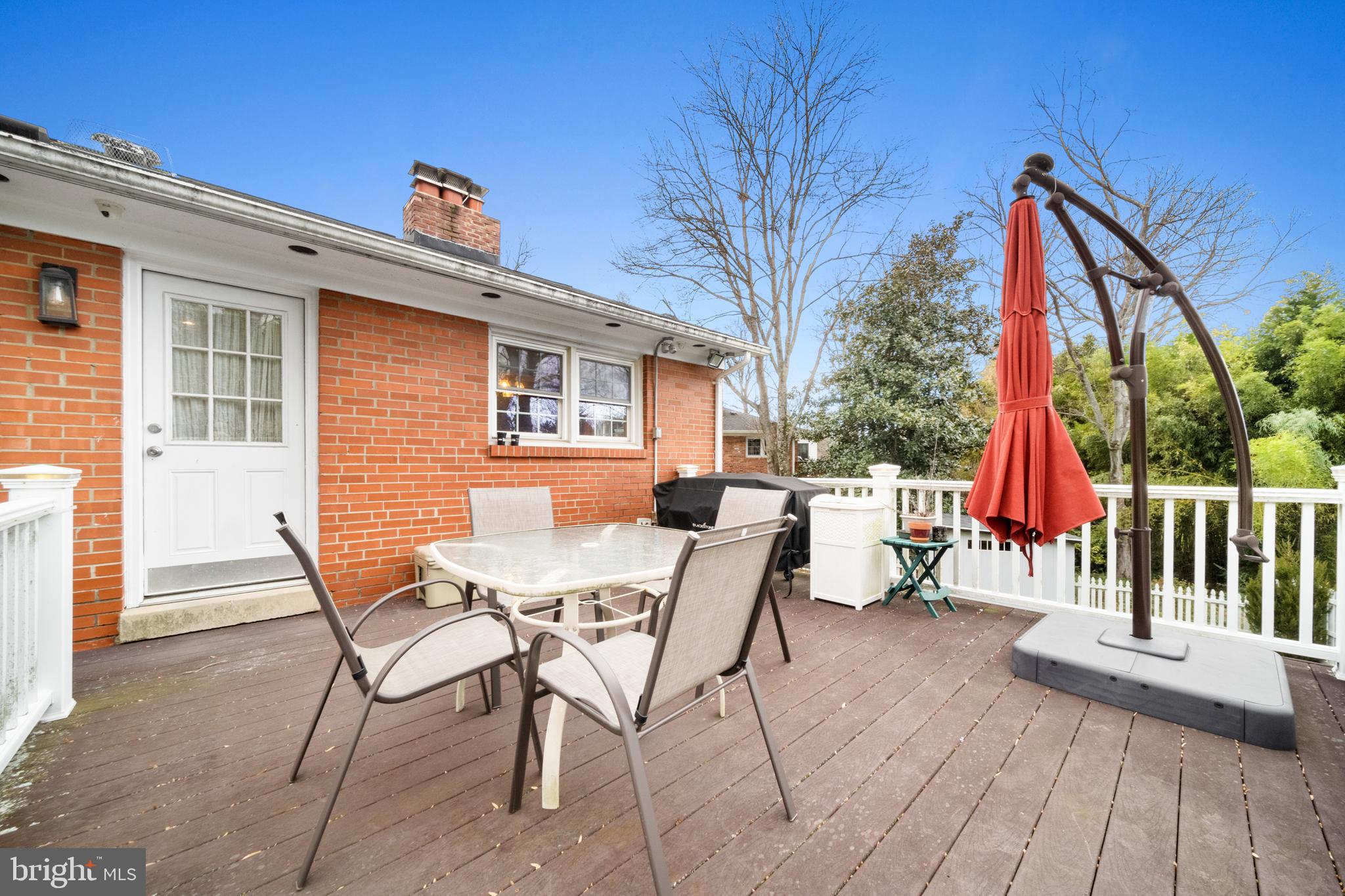 10600 Springmann Drive Fairfax, VA 22030 - Photo 63 of 78 a view of a house with a bench and wooden floor
