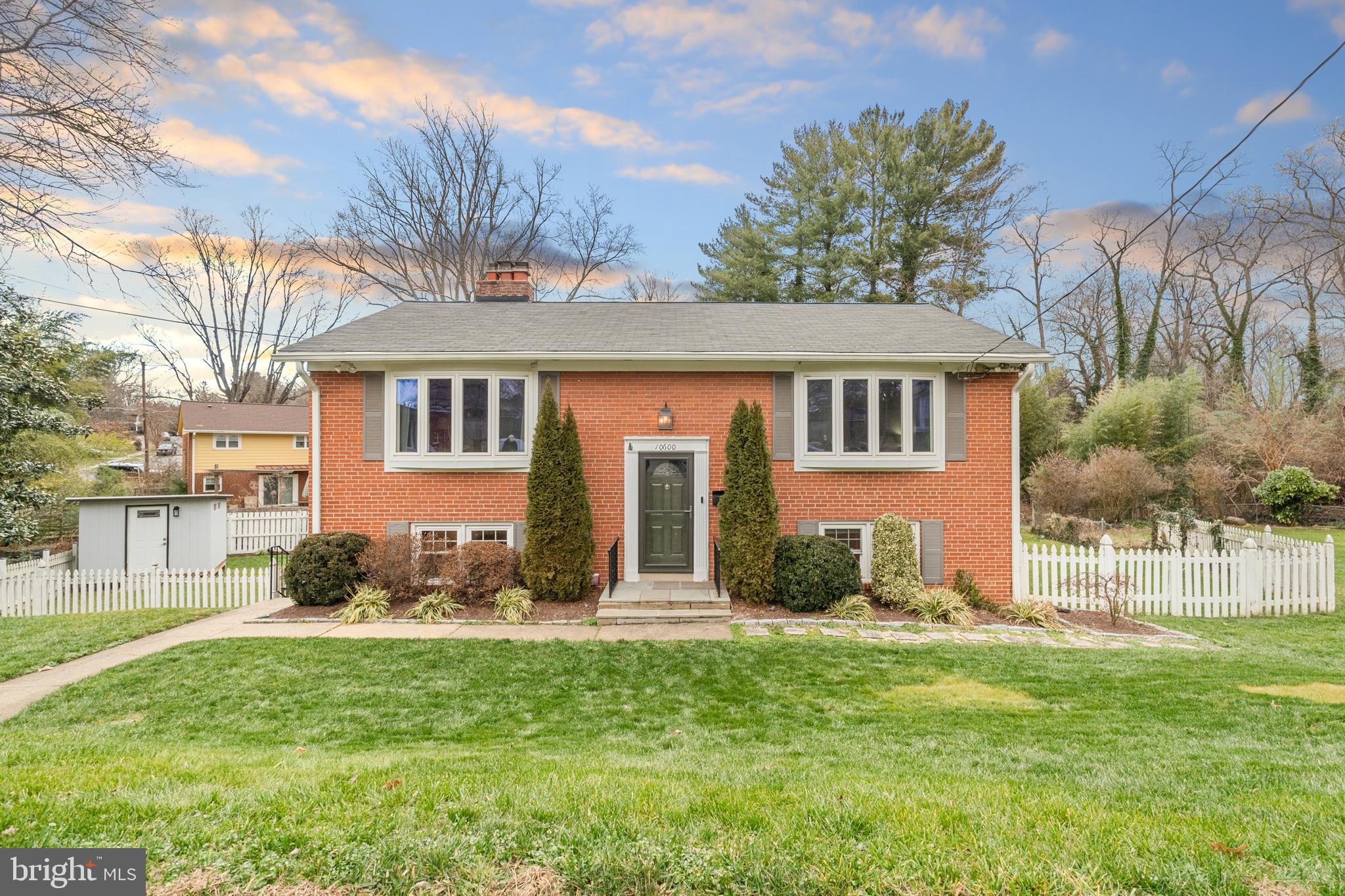 10600 Springmann Drive Fairfax, VA 22030 - Photo 78 of 78 a front view of a house with a yard