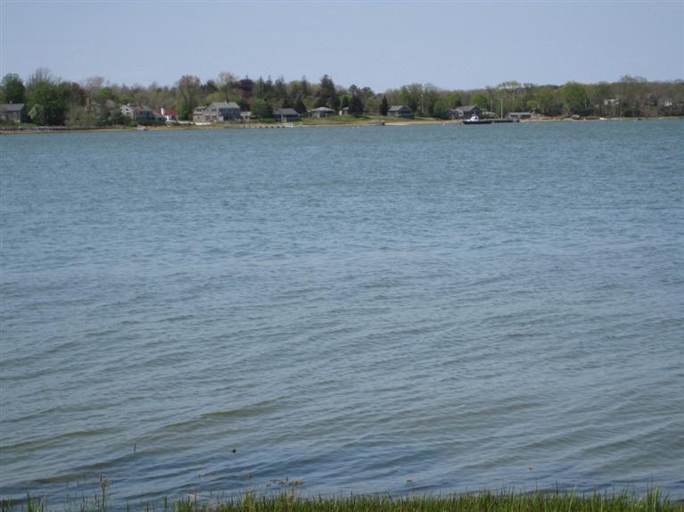 138 Tonset Road Orleans, MA 02653 - Photo 5 of 6 a view of lake with mountain in the background