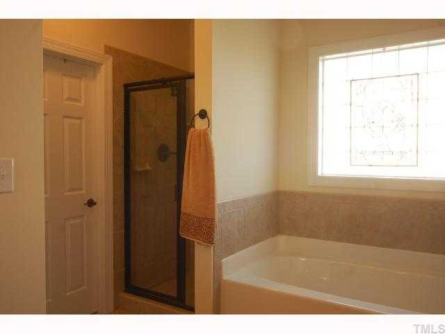 306 Challenge Road Raleigh, NC 27603 - Photo 9 of 12 Master soaking tub and separate ceramic shower Master Bath/Spa