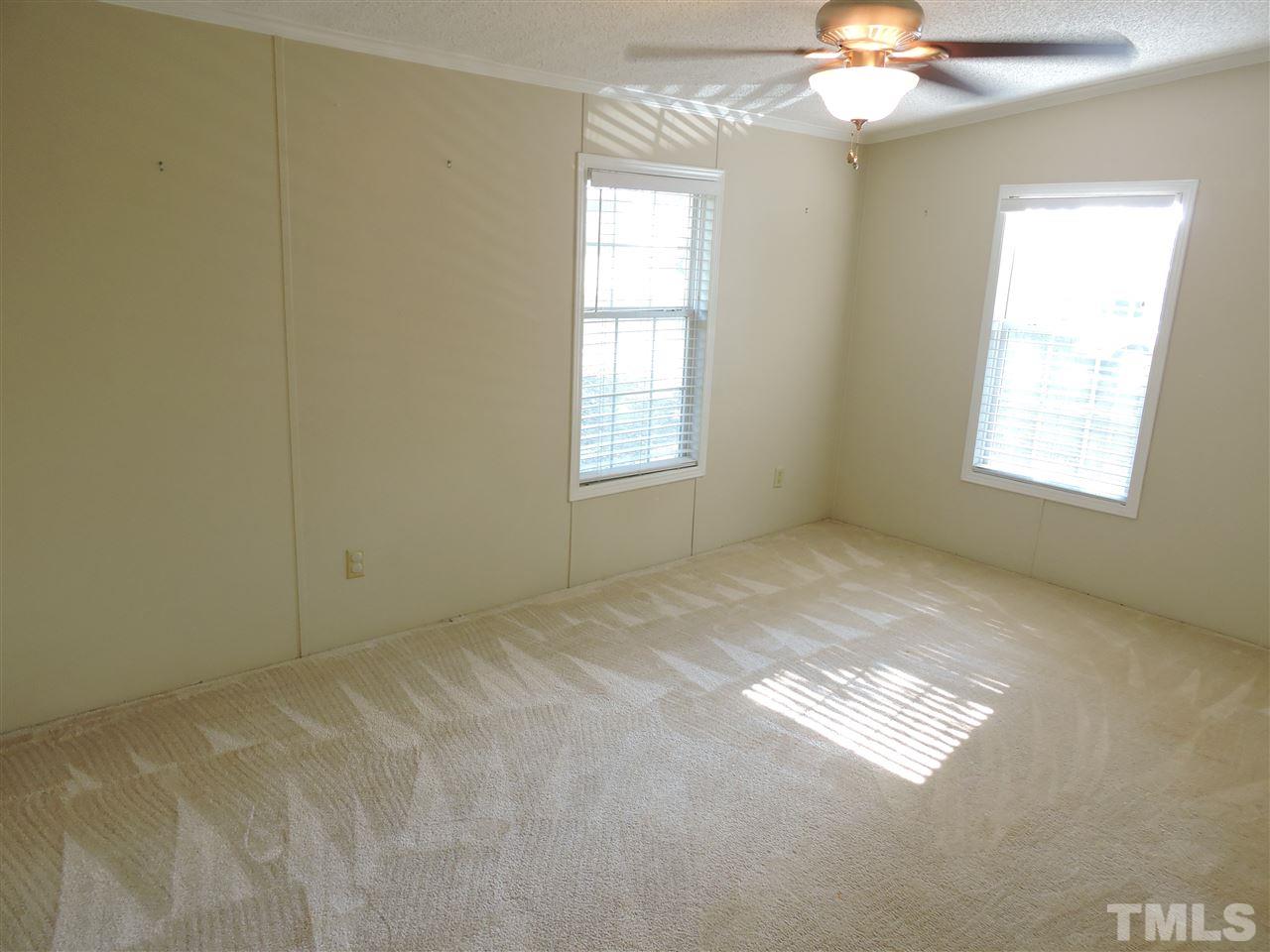 225 Bowling Road Roxboro, NC 27574 - Photo 12 of 19 a view of an empty room with a window