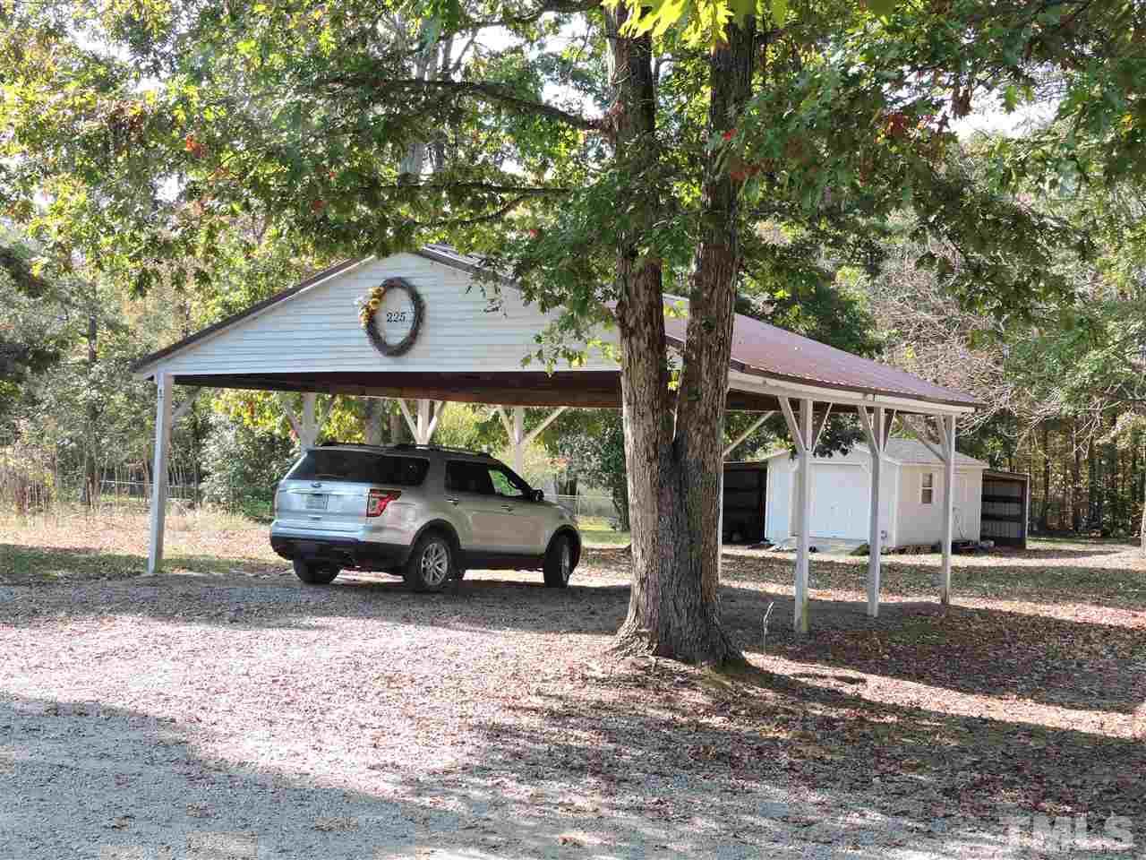 225 Bowling Road Roxboro, NC 27574 - Photo 19 of 19 a view of house with outdoor space