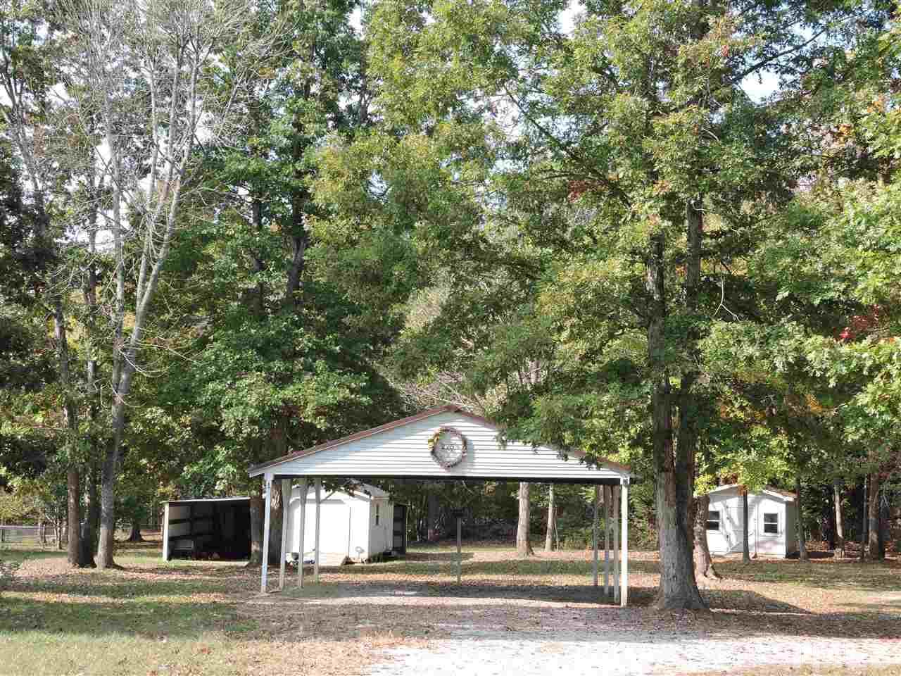 225 Bowling Road Roxboro, NC 27574 - Photo 10 of 19 a front view of a house with a yard and garage