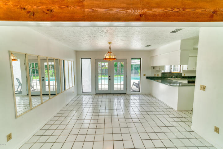 209 Randy Road Panama City Beach, FL 32413 - Photo 6 of 36 Eating Area with door leading to yard