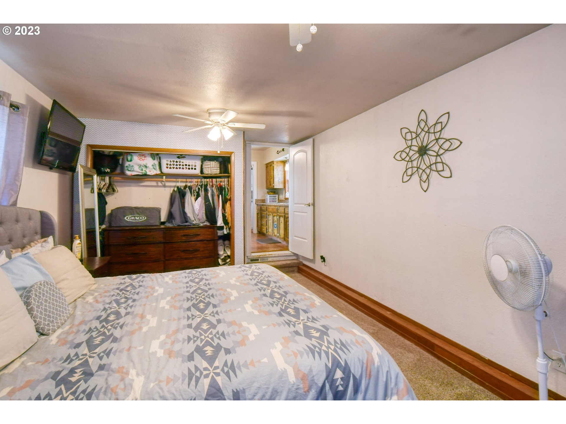 615 Northwest 5th Street Pendleton, OR 97801 - Photo 20 of 33 a bedroom with a bed and a large mirror
