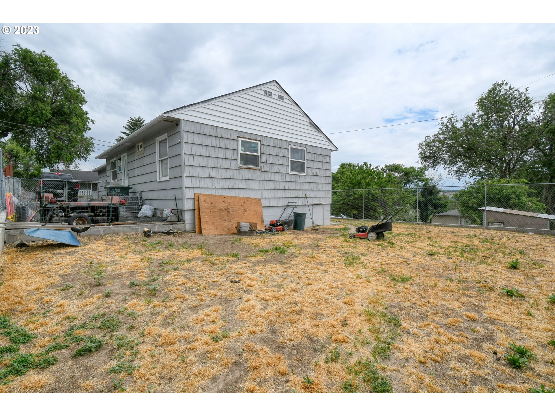 615 Northwest 5th Street Pendleton, OR 97801 - Photo 32 of 33 a view of backyard of house and car parked