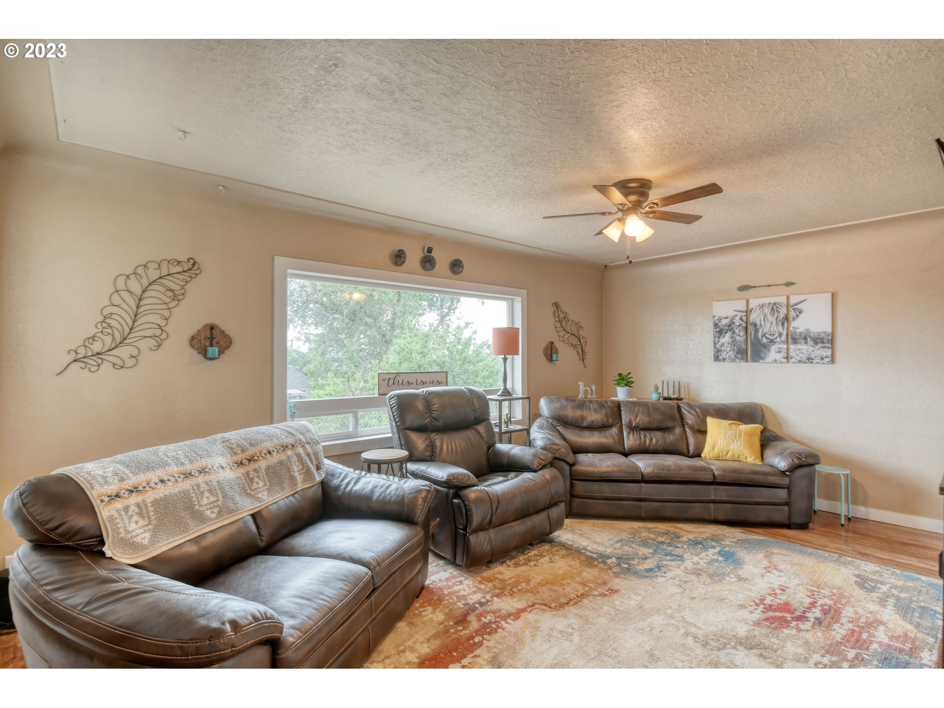 615 Northwest 5th Street Pendleton, OR 97801 - Photo 8 of 33 a living room with furniture and a large window