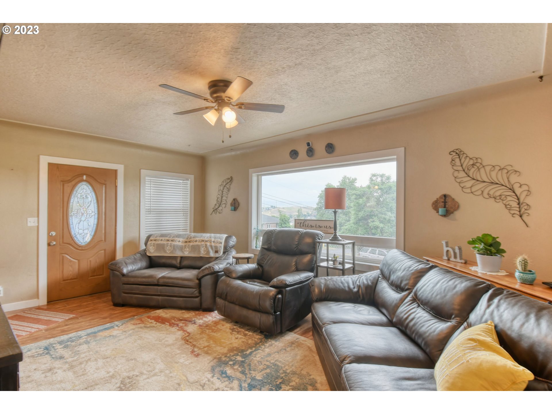 615 Northwest 5th Street Pendleton, OR 97801 - Photo 9 of 33 a living room with furniture and a large window