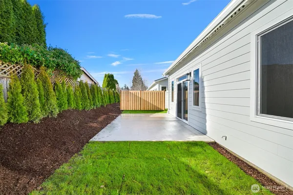 a view of backyard with green space